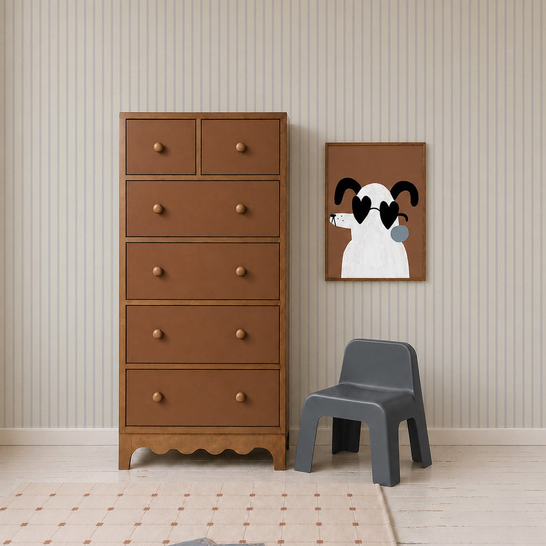 A tall brown dresser stands next to a gray children’s chair and a framed dog illustration with sunglasses on a striped wall featuring Pinstripe Wallpaper Sky in a minimalist room.