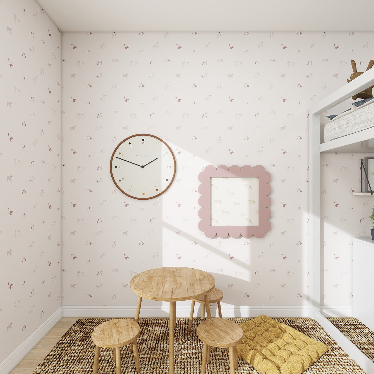 Children’s playroom with small wooden table and stools, a circular wall clock, scalloped-edge mirror, Ruffles Bull Dog Wallpaper Repeat Pattern in Rose with subtle animal prints, and a yellow floor cushion on a woven rug. Sunlight streams in.