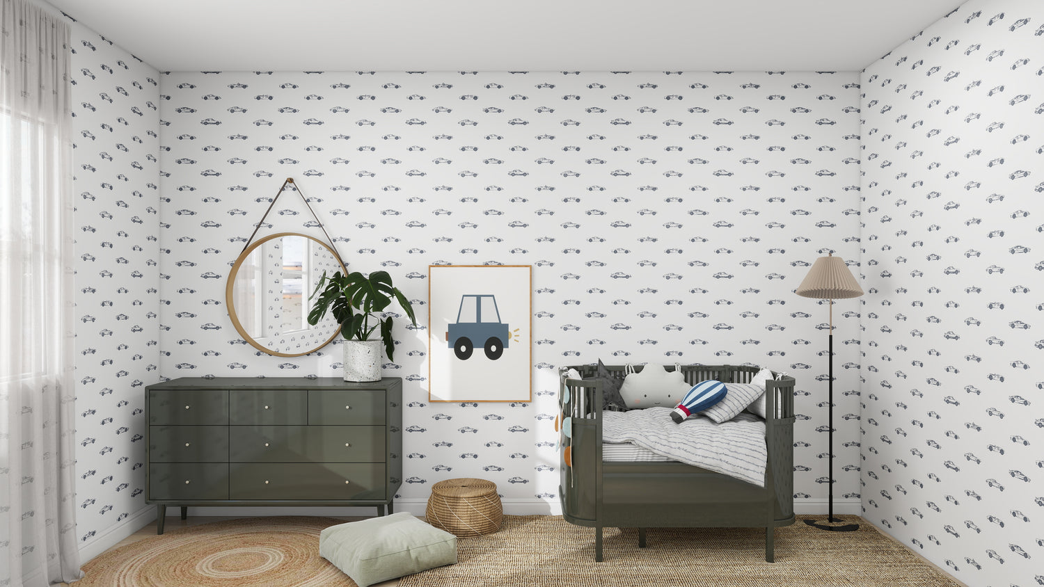 A cozy nursery room decorated with munks and mes Vintage Cars Wallpaper Repeat Pattern featuring charming vehicles. It includes a dark green crib, matching dresser with a plant, circular mirror, and lampshade. A car picture hangs above a round woven rug and cushions on the floor.