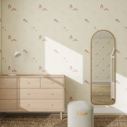 A minimalist bedroom features light wood furniture, a tall arched mirror, and walls adorned with the Custom Puppy Dog Wallpaper Repeat Pattern in Rose. Sunlight filters in, highlighting chic decor accents and playful puppy illustrations.