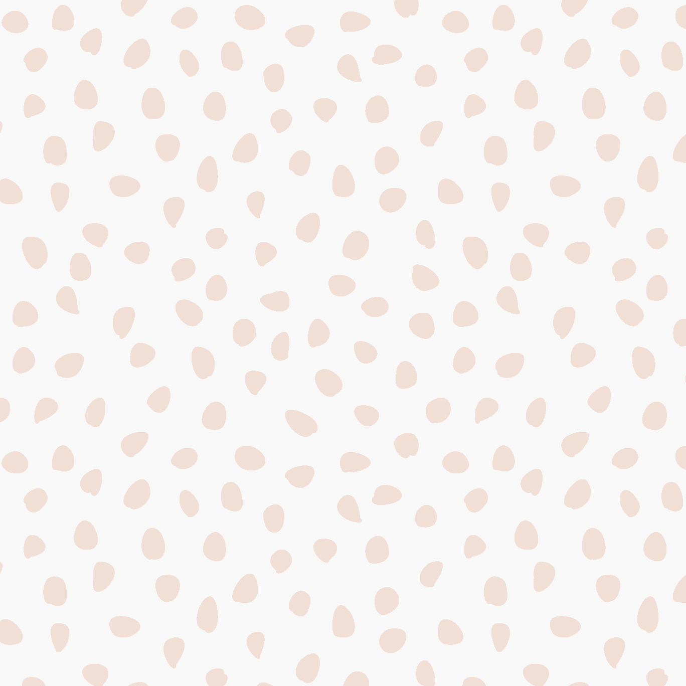 Sprinkle Wallpaper Sample, Pink features light pink, irregular polka dots scattered across a white background in a seamless, minimalist design. The varying sizes and shapes of the dots lend subtle charm and softness to any space, making this high-quality wallpaper an ideal choice for those seeking a playful yet understated look.