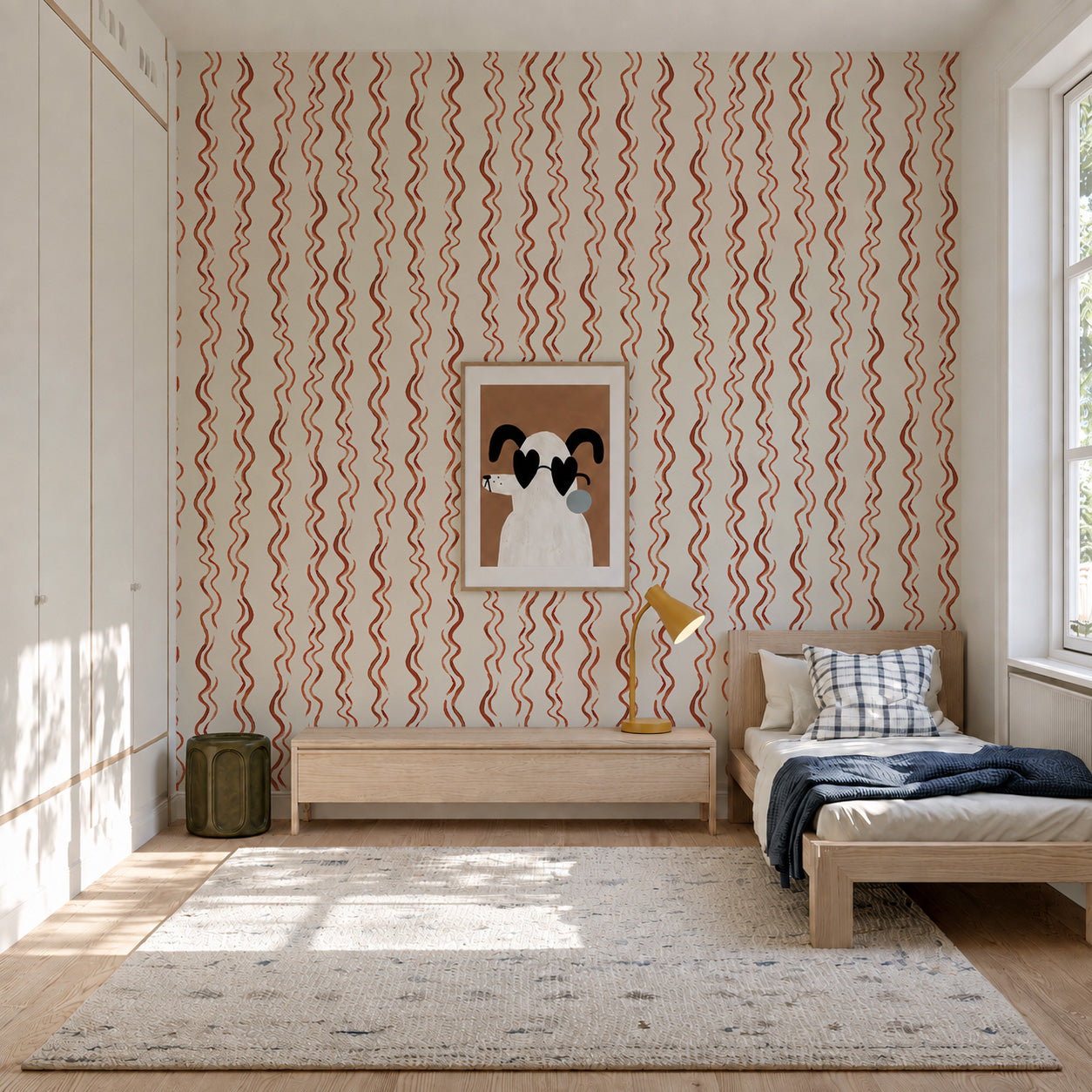 Minimalist bedroom with a single bed, wooden furniture, Wiggle Stripe Wallpaper in red wavy tones, a framed abstract animal artwork, a yellow desk lamp, and a large window letting in natural light.